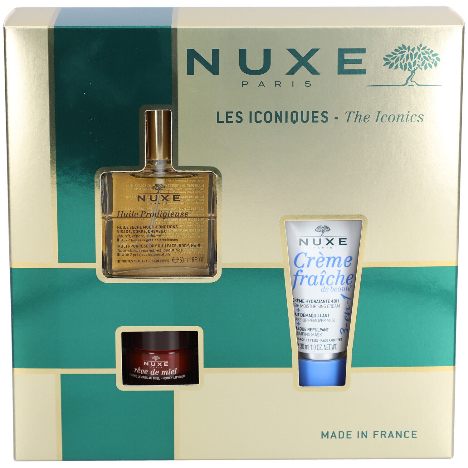 Coffret cadeau avec trois produits. Emballage doré avec ouvertures. Logo Nuxe et noms de produits visibles.