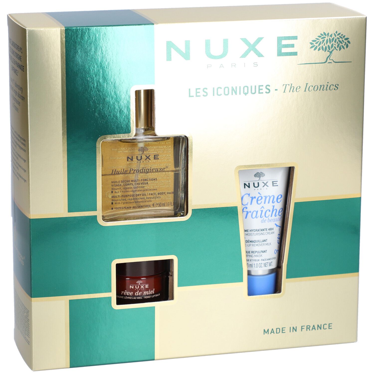 Coffret cadeau avec trois produits. Emballage doré avec ouvertures. Logo Nuxe et noms de produits visibles.