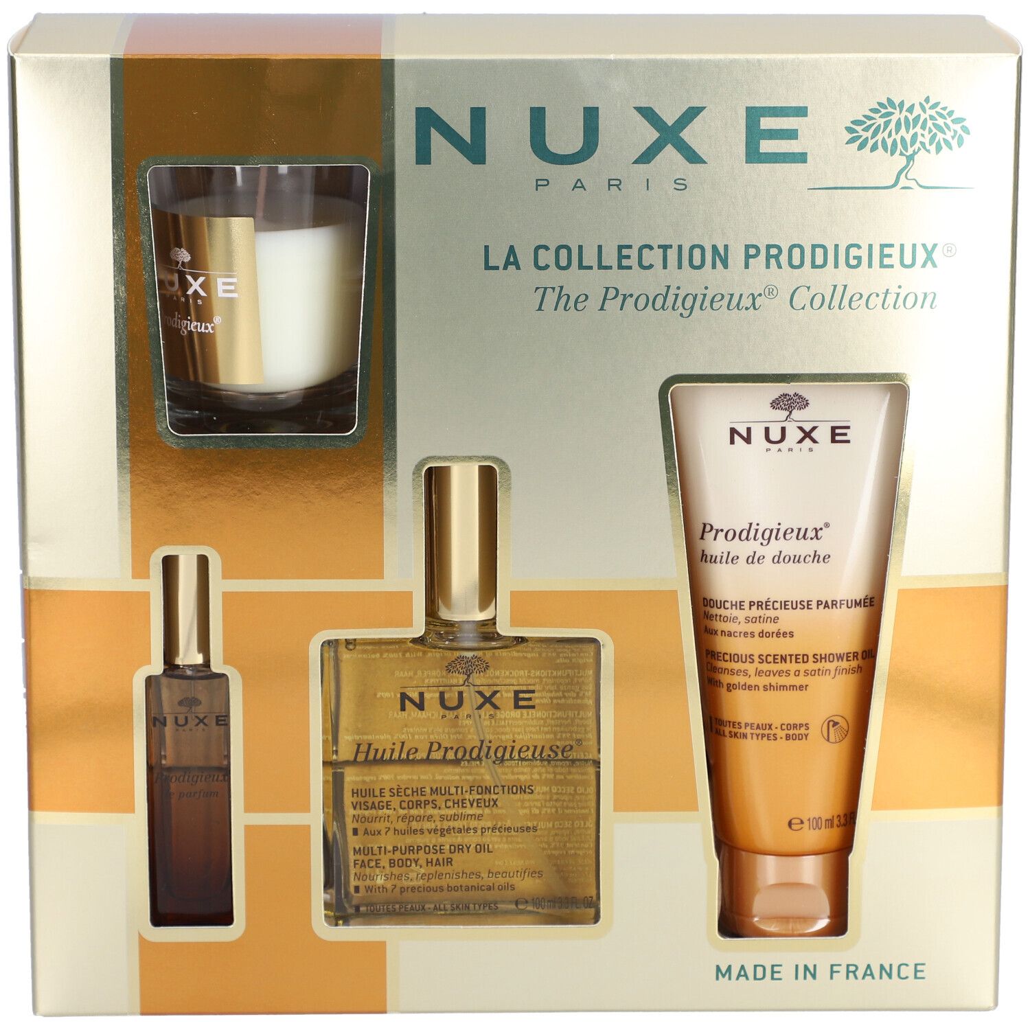 Coffret cadeau Nuxe. Contient huile, gel douche et bougie. Emballage doré avec noms de produits.