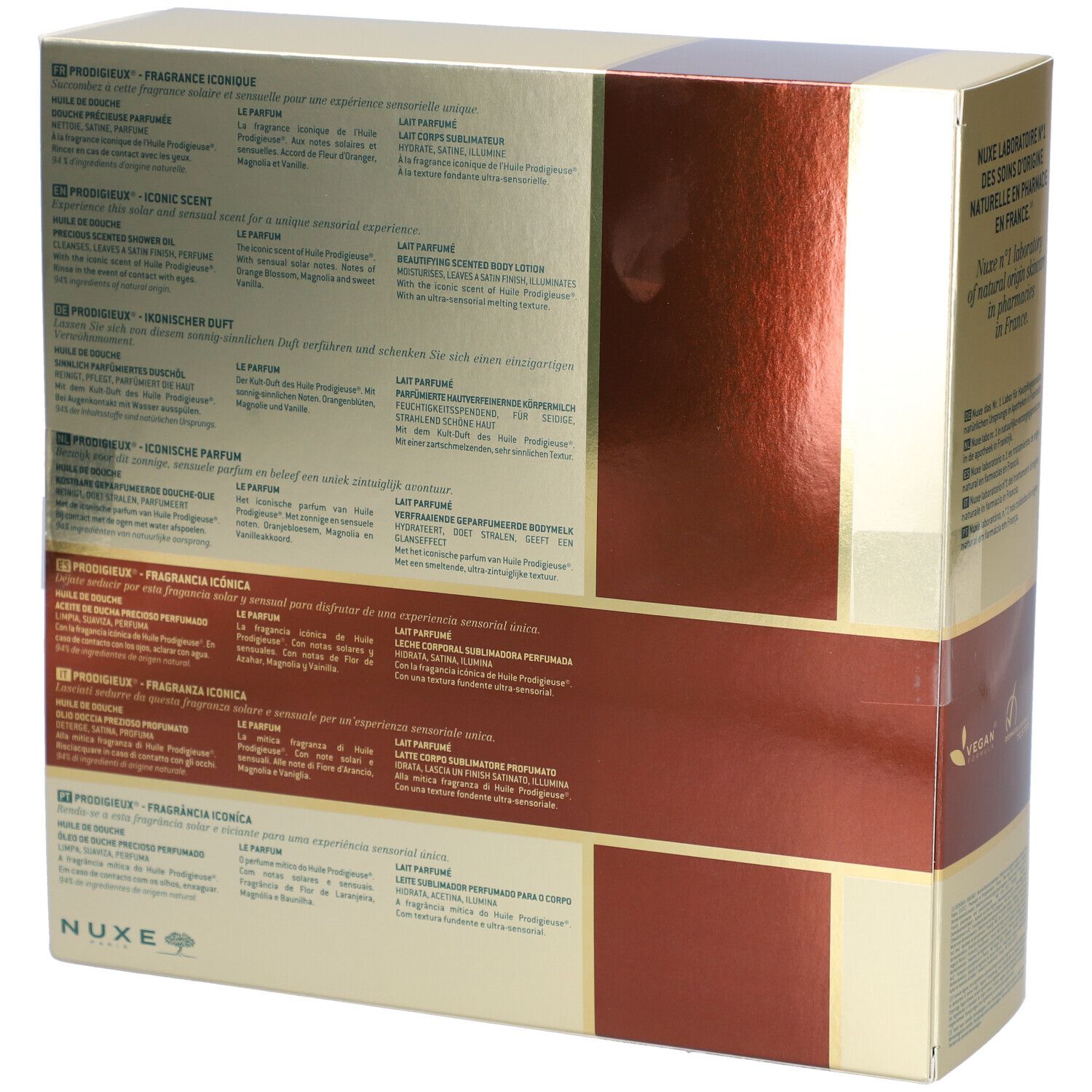 Dos du coffret cadeau avec informations produit en plusieurs langues. Tons dorés et bruns.