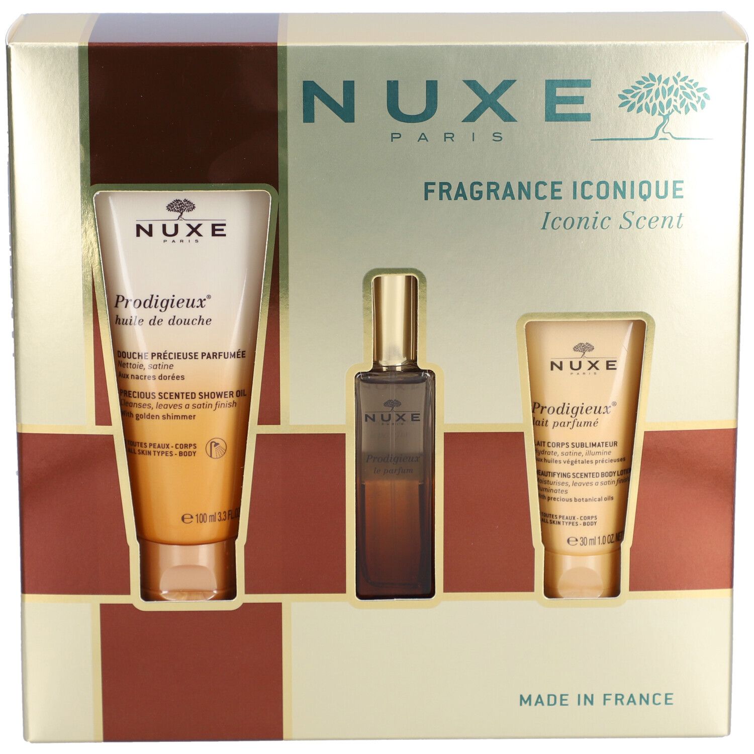 Coffret cadeau Nuxe avec huile de douche, parfum et lotion. Emballage doré avec noms de produits visibles.
