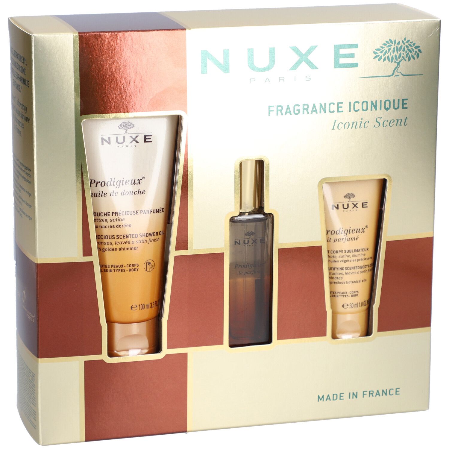 Coffret cadeau Nuxe avec huile de douche, parfum et lotion. Emballage doré avec noms de produits visibles.