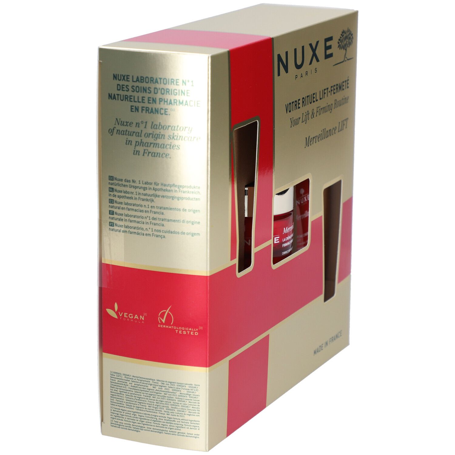 Emballage doré et rouge avec trois produits. Logo vegan et texte en français. Marque Nuxe.