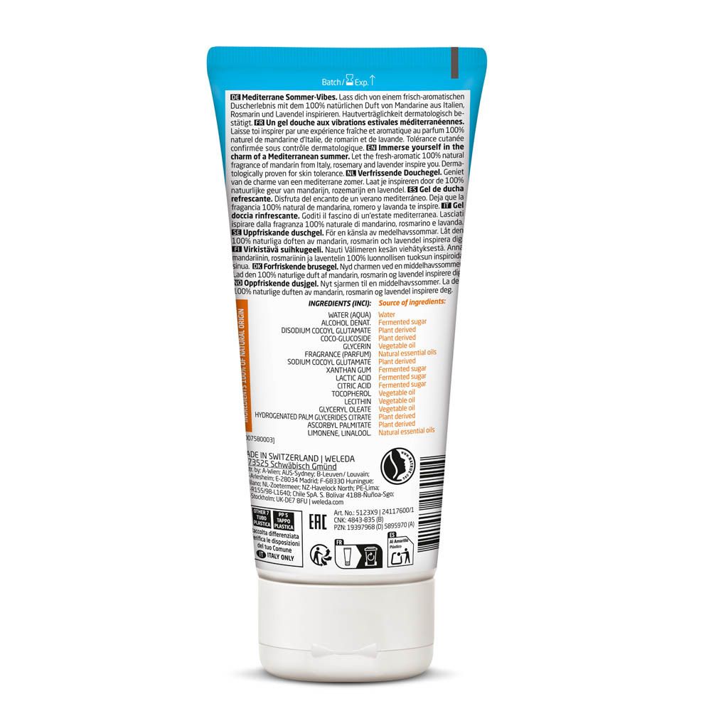 Achterkant van een lichtblauwe tube. Meertalige tekst, ingrediënten, fabrikantinfo, recyclingsymbolen.