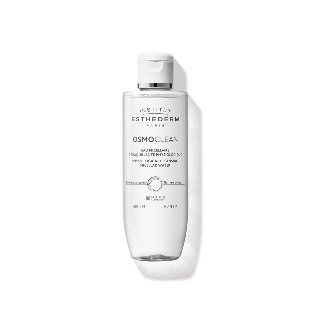 Transparante fles met witte dop. Opschrift: Institut Esthederm, Osmoclean, Eau Micellaire Démaquillante Physiologique, Micellar Water.