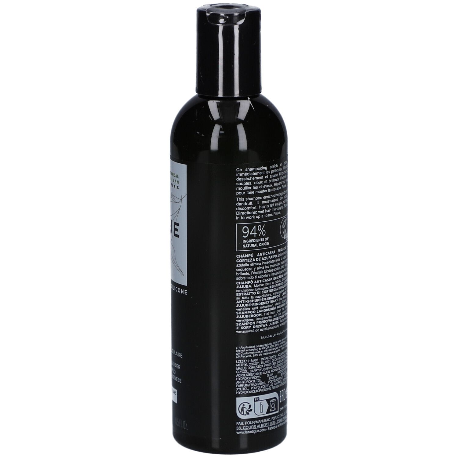 Schwarze Flasche mit schwarzem Klappdeckel. Enthält Shampoo. Beschriftung mit "94% Inhaltsstoffe natürlichen Ursprungs".