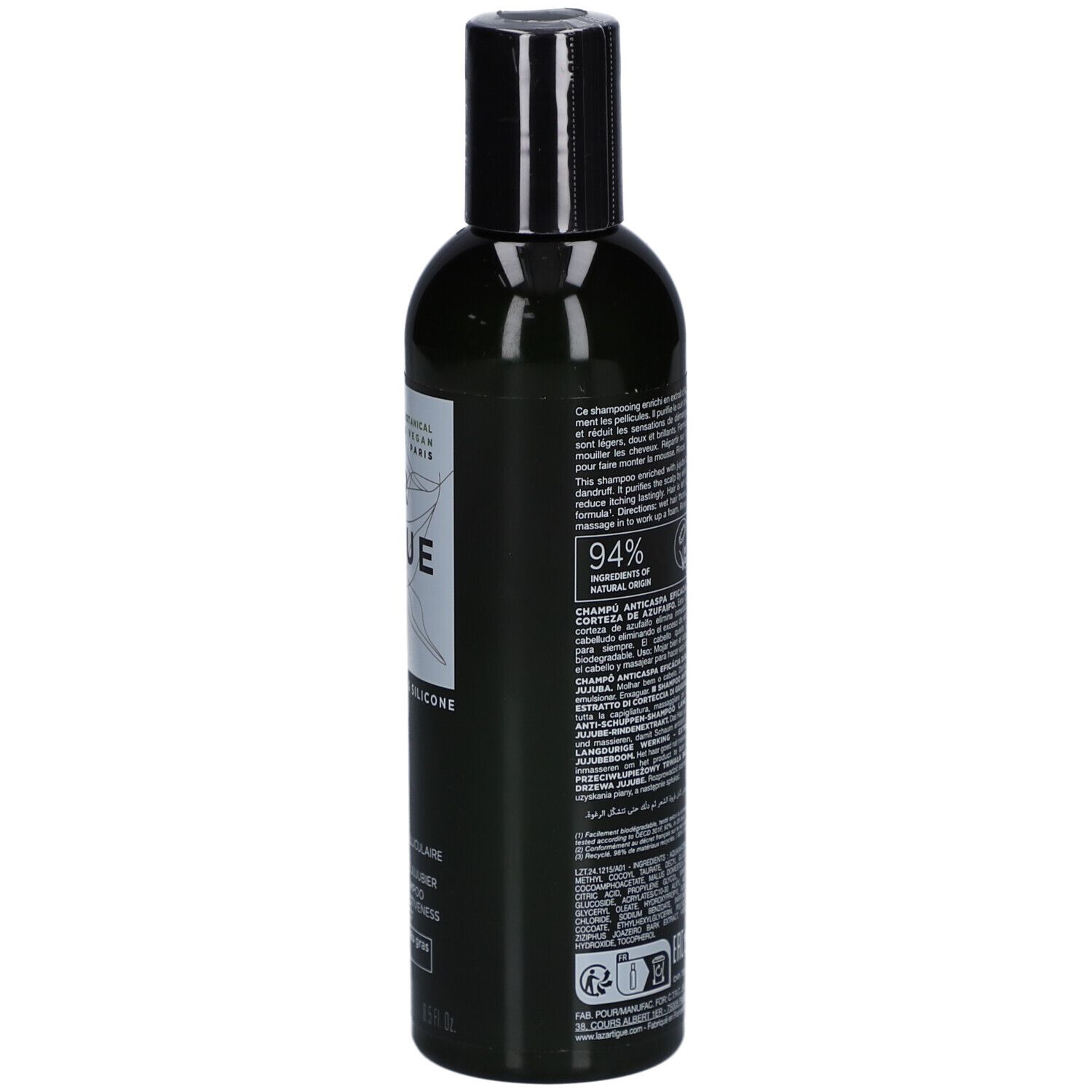Grüne Flasche mit schwarzem Deckel. Text auf der Rückseite. Vegan-Logo und weitere Informationen.