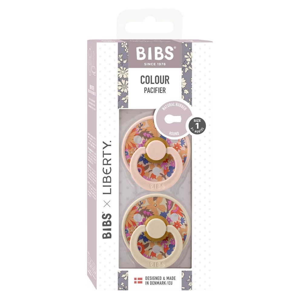 Verpackung mit zwei Schnullern. Floral bedruckt, rosa und cremefarben. Marke: BIBS x Liberty. Größe 1.