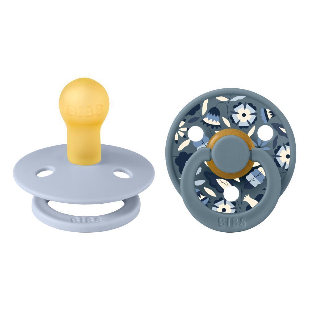 Zwei Schnuller. Blau, gelb. Runde Form. BIBS-Logo. Blumenmuster. 0-6 Monate.