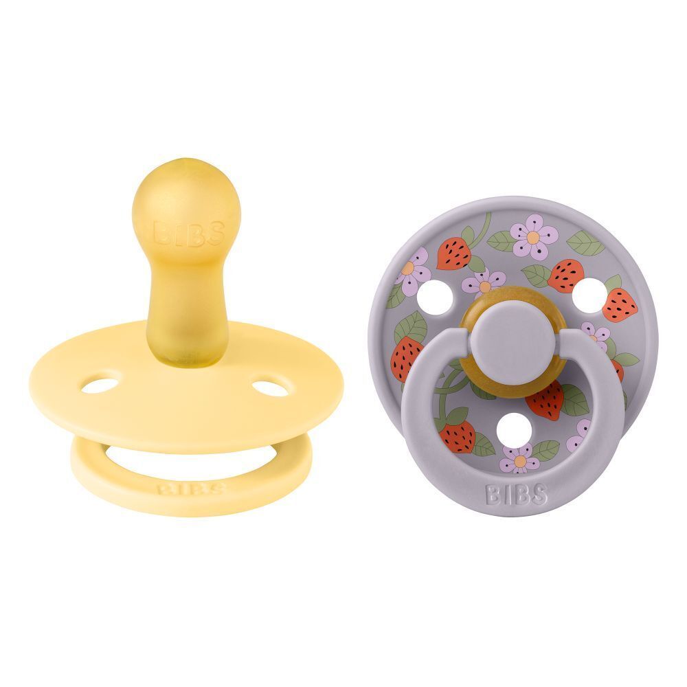 Deux sucettes. Sucette jaune et sucette grise avec motifs fraises et fleurs. Taille 2.