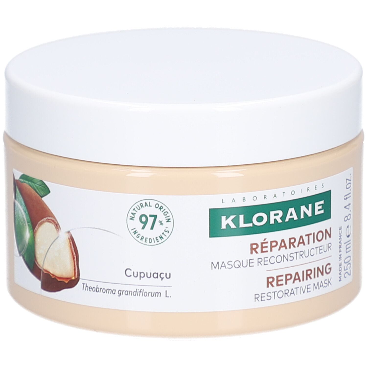 Beige Tiegel mit weißem Deckel. Aufkleber mit Logo, Text, Cupuaçu-Frucht und Volumenangabe: 250 ml.