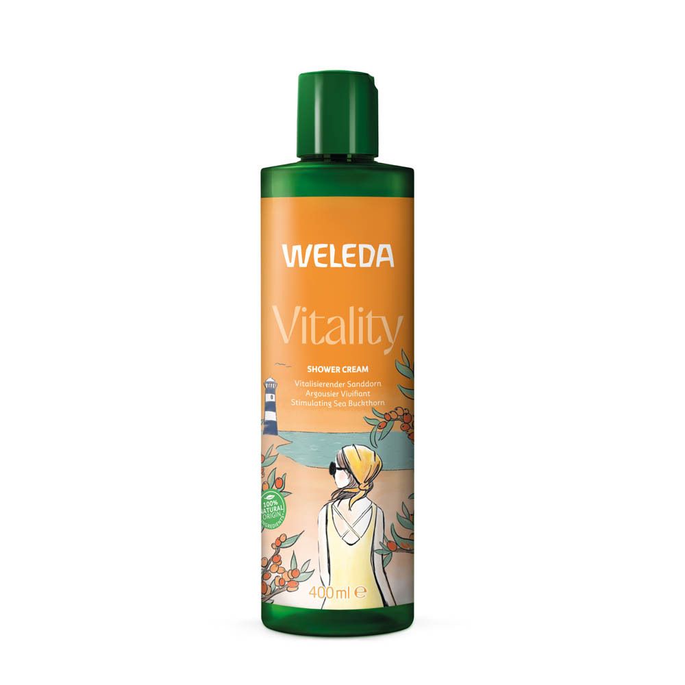 Flacon vert avec étiquette orange. Inscription: WELEDA Vitality, crème de douche. Illustration d'une femme au bord de la mer.