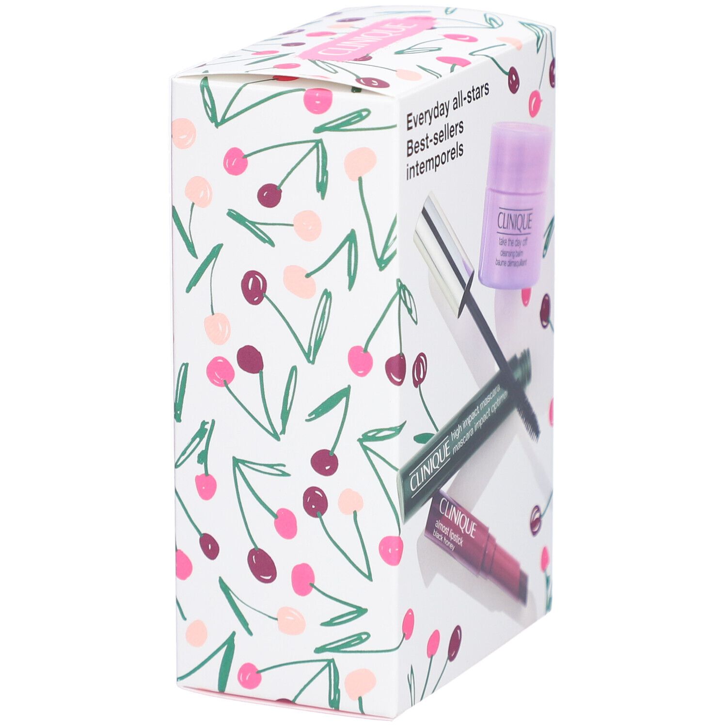Coffret Clinique. Motif cerise. Produits: mascara, baume nettoyant, rouge à lèvres.