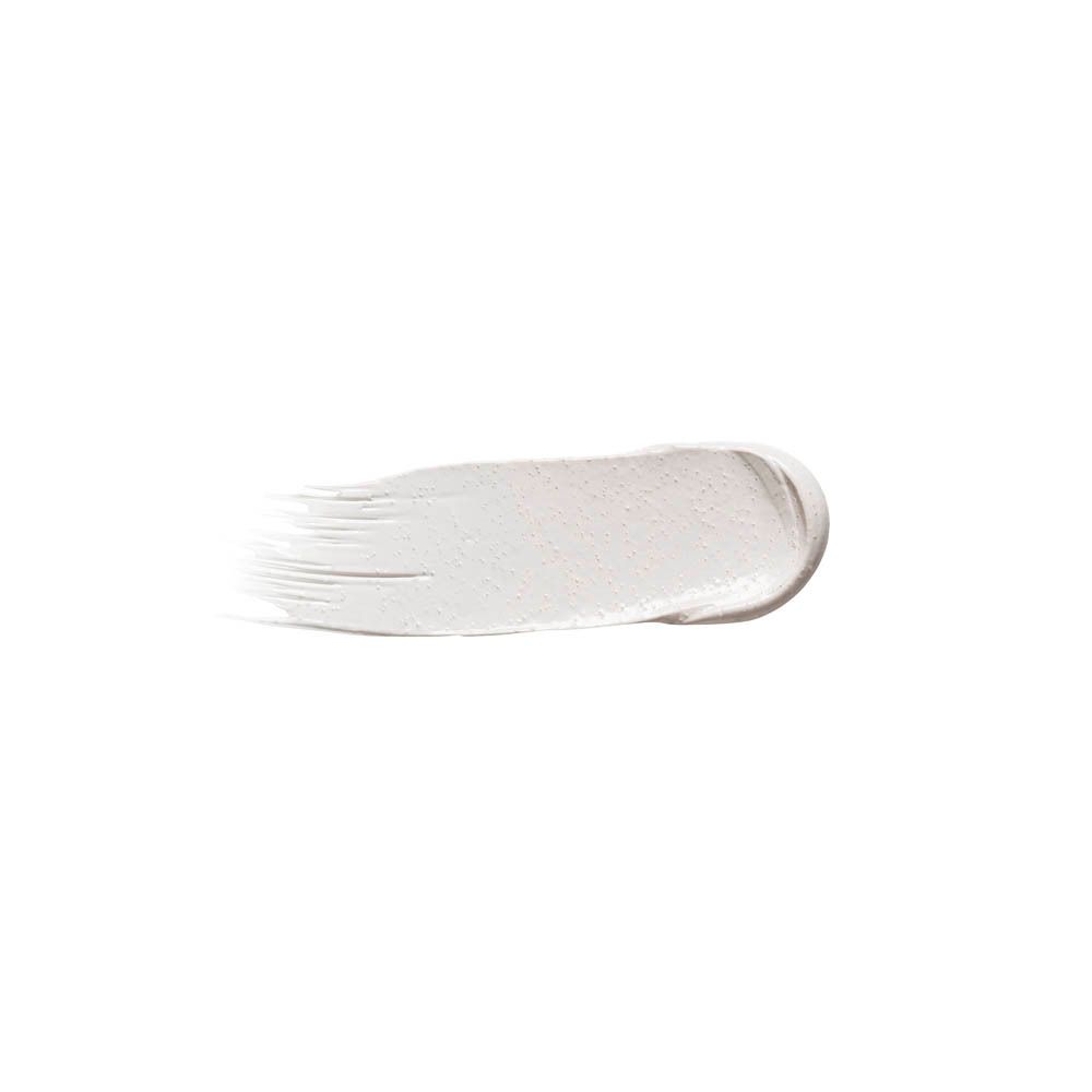 Trait de produit blanc sur fond blanc. Texture visible.