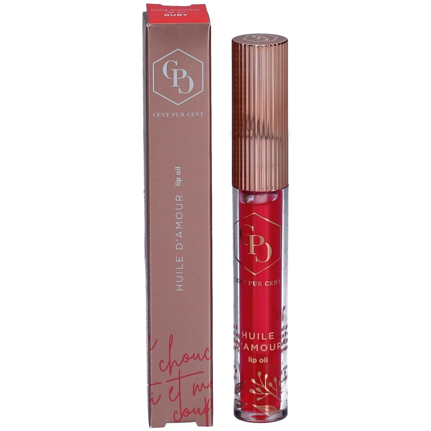 Huile à lèvres et emballage. Huile à lèvres rouge en tube avec bouchon doré. Emballage: Rose, inscription: Cent Pur Cent, Huile d'Amour.