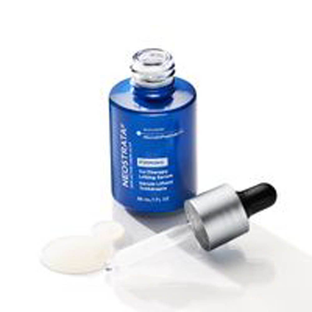 Fles met pipet, serum ernaast. Opschrift: Neostrata, Skin Active, Derm Actif. Productnaam: Tri-Therapy Lifting Serum.