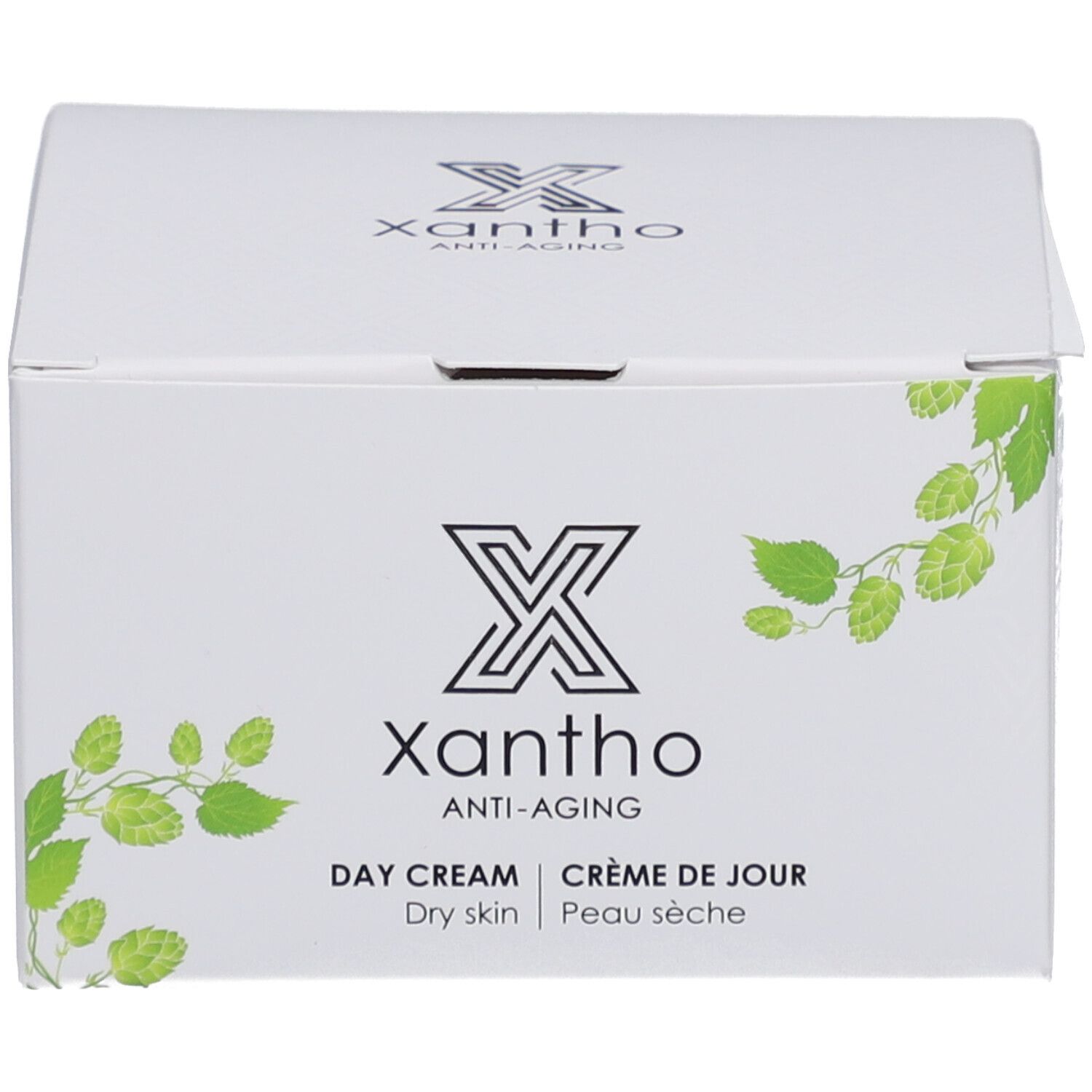 Karton mit Aufschrift: Xantho, Anti-Aging, Day Cream, Dry skin, Crème de Jour, Peau sèche. Mit grünen Blättern.