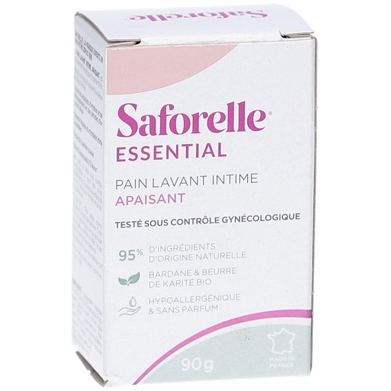 Saforelle Essential Verpackung. Weißer Karton mit rosa Akzenten. Text: Pain Lavant Intime Apaisant, 90g, 95% natürliche Inhaltsstoffe. Gynäkologisch getestet.