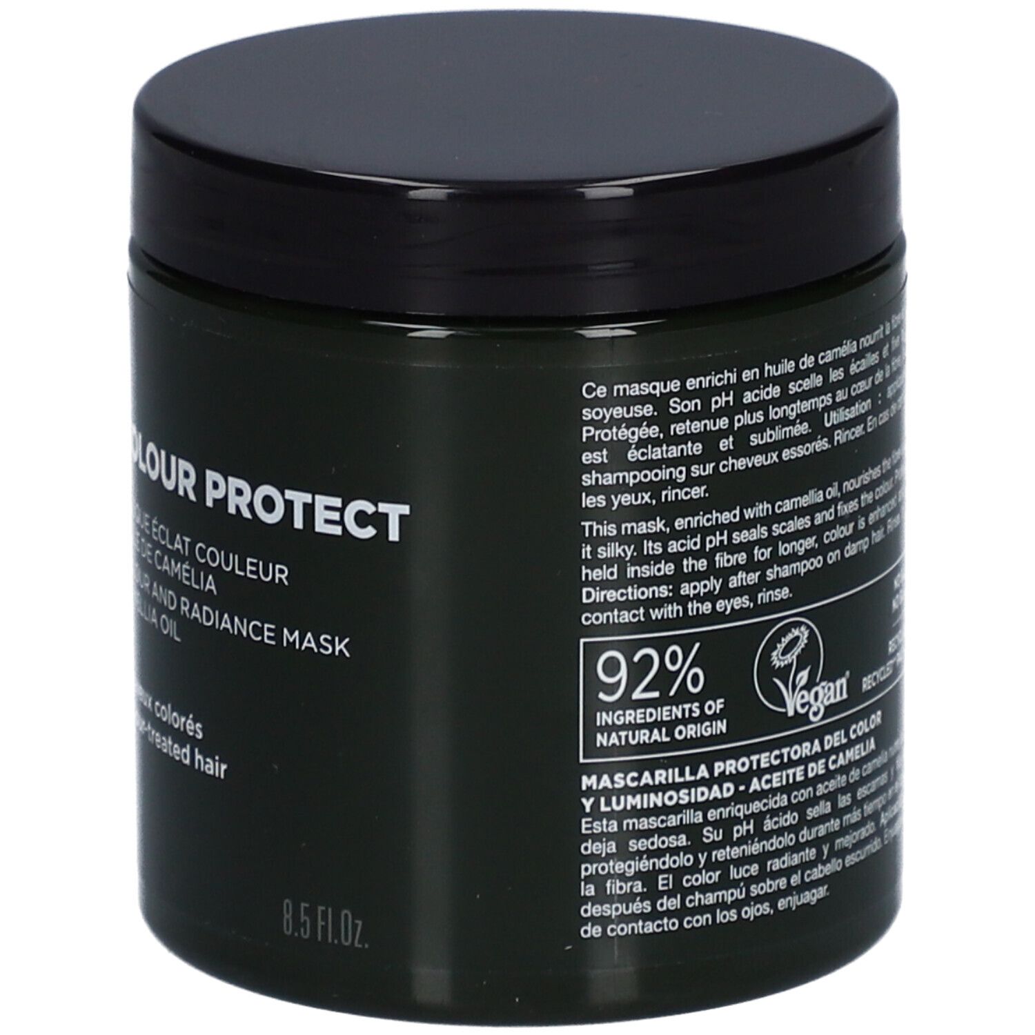 Achterkant van een donkergroene pot met zwart deksel. Tekst: 92% ingrediënten van natuurlijke oorsprong, Vegan, 8.5 fl.oz.