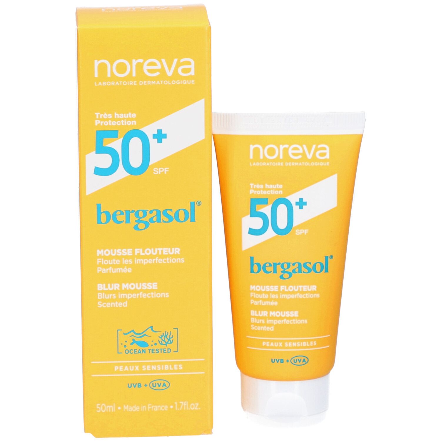Gelbe Schachtel und Tube. Aufschrift: Noreva, 50+ SPF, bergasol, Mousse Flouteur, Blur Mousse, Peaux Sensibles. Mit 'Ocean Tested' Logo.