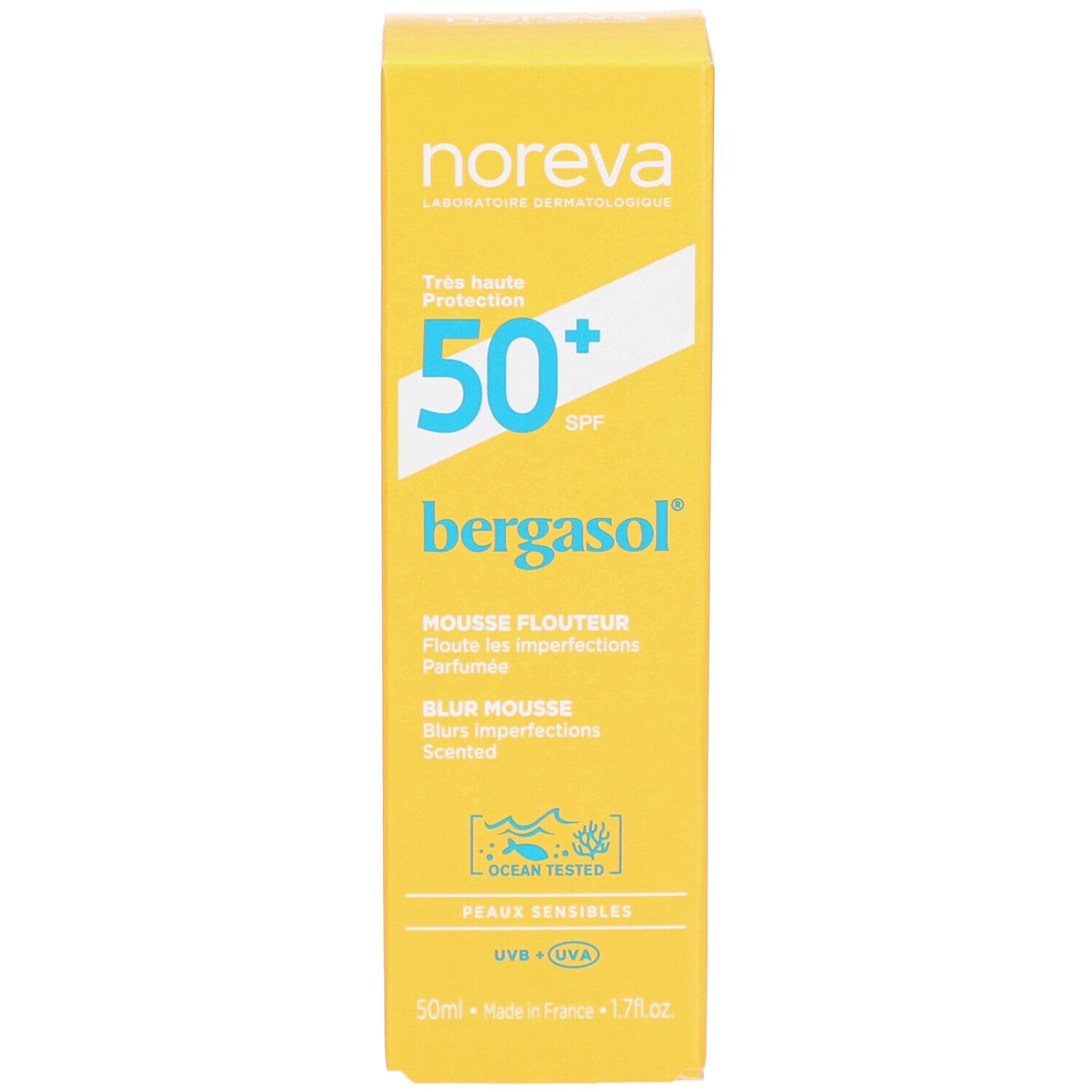 Gelbe Schachtel. Aufschrift: Noreva, 50+ SPF, bergasol, Mousse Flouteur, Blur Mousse, Peaux Sensibles. Mit 'Ocean Tested' Logo.