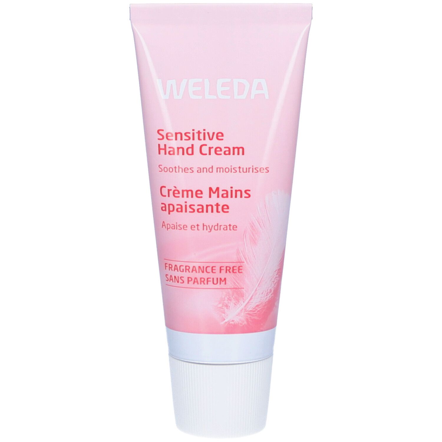 Roze tube met witte dop. Opschrift: Weleda, Sensitive Hand Cream, Crème Mains apaisante, Fragrance Free.