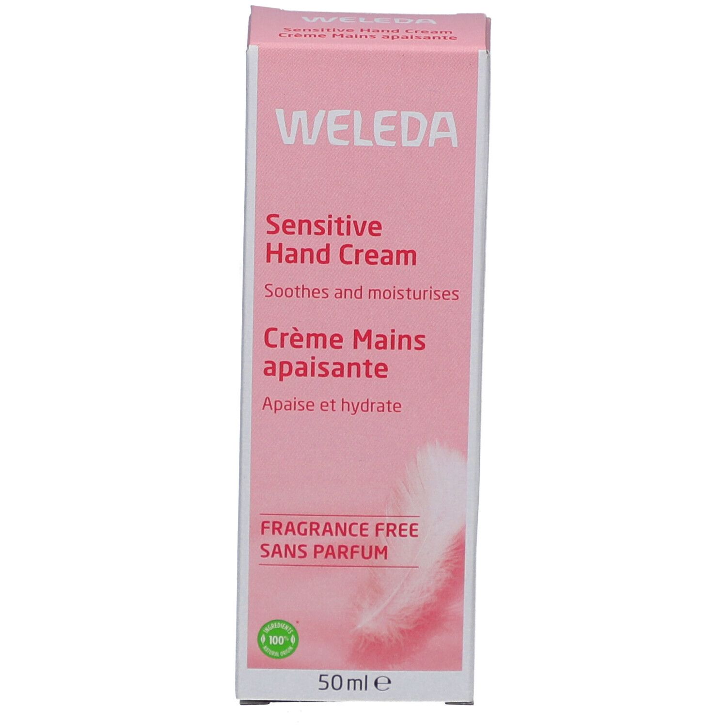 Roze doos. Opschrift: Weleda, Sensitive Hand Cream, Crème Mains apaisante, Fragrance Free, 50ml, logo.