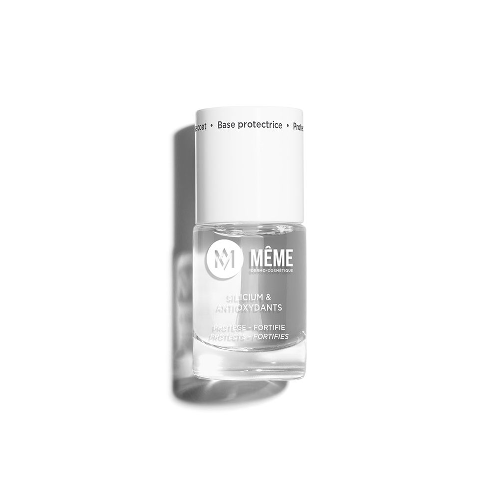 Flacon de vernis à ongles transparent avec bouchon blanc. Inscription: Silicium & Antioxydants. Marque: MÊME.