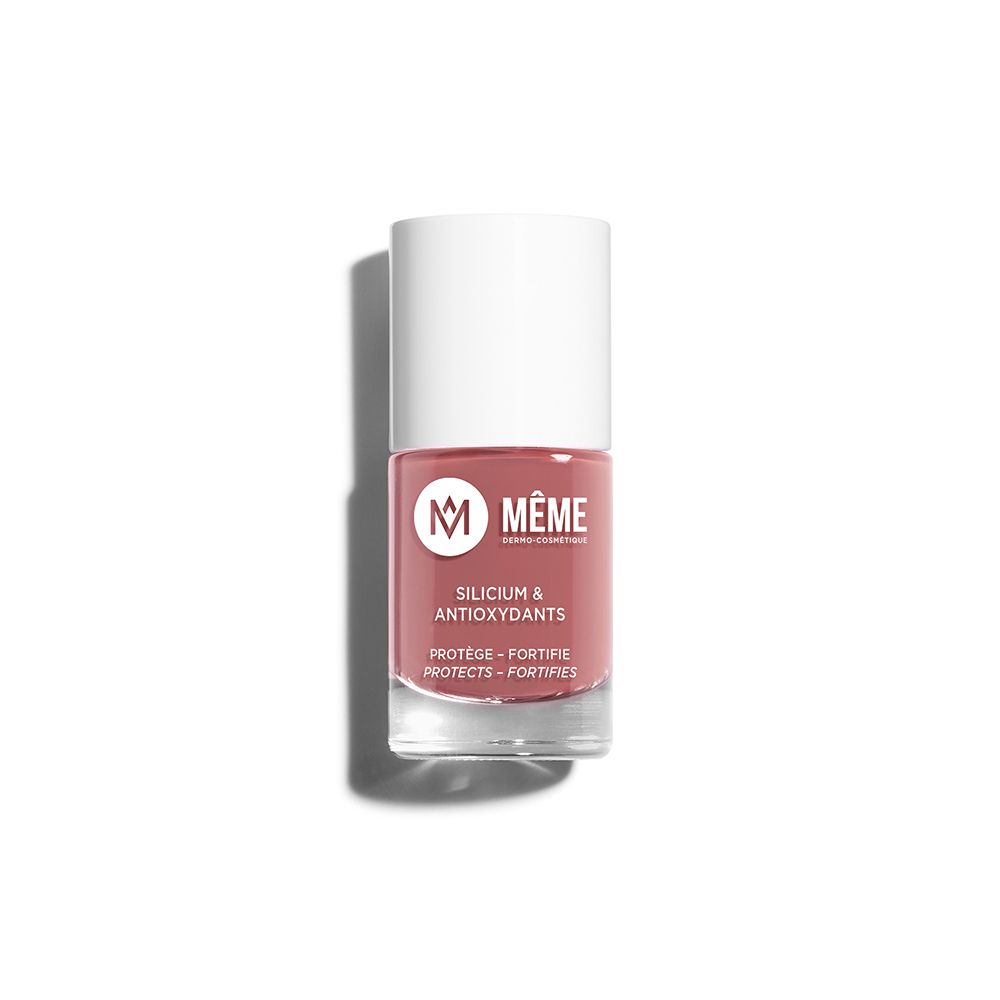 Flacon de vernis à ongles rose avec bouchon blanc. Inscription: MEME, Silicium & Antioxydants.