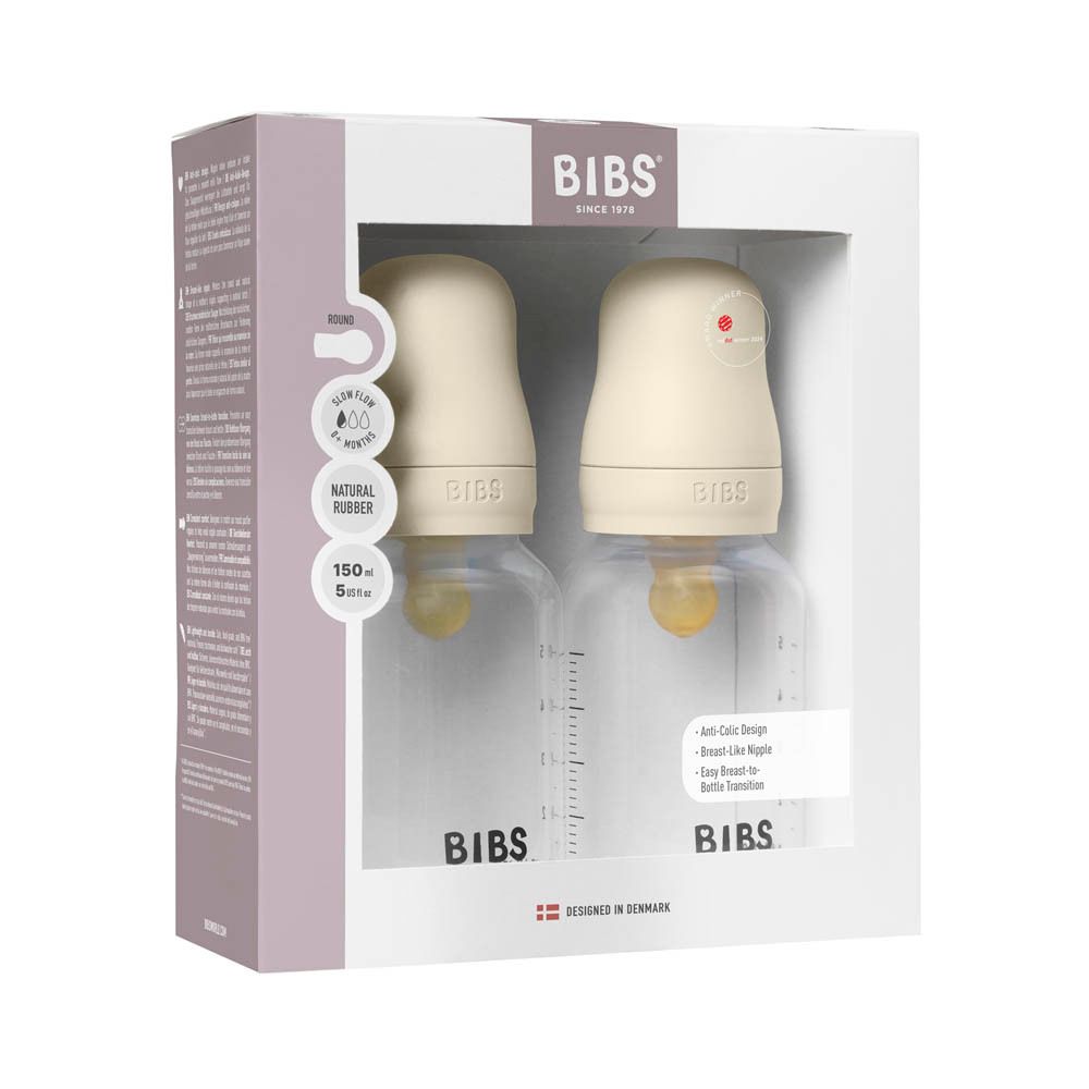 Deux biberons dans l'emballage. Bouteilles, tétines, couvercles. Marque BIBS. Ivoire. 150ml.