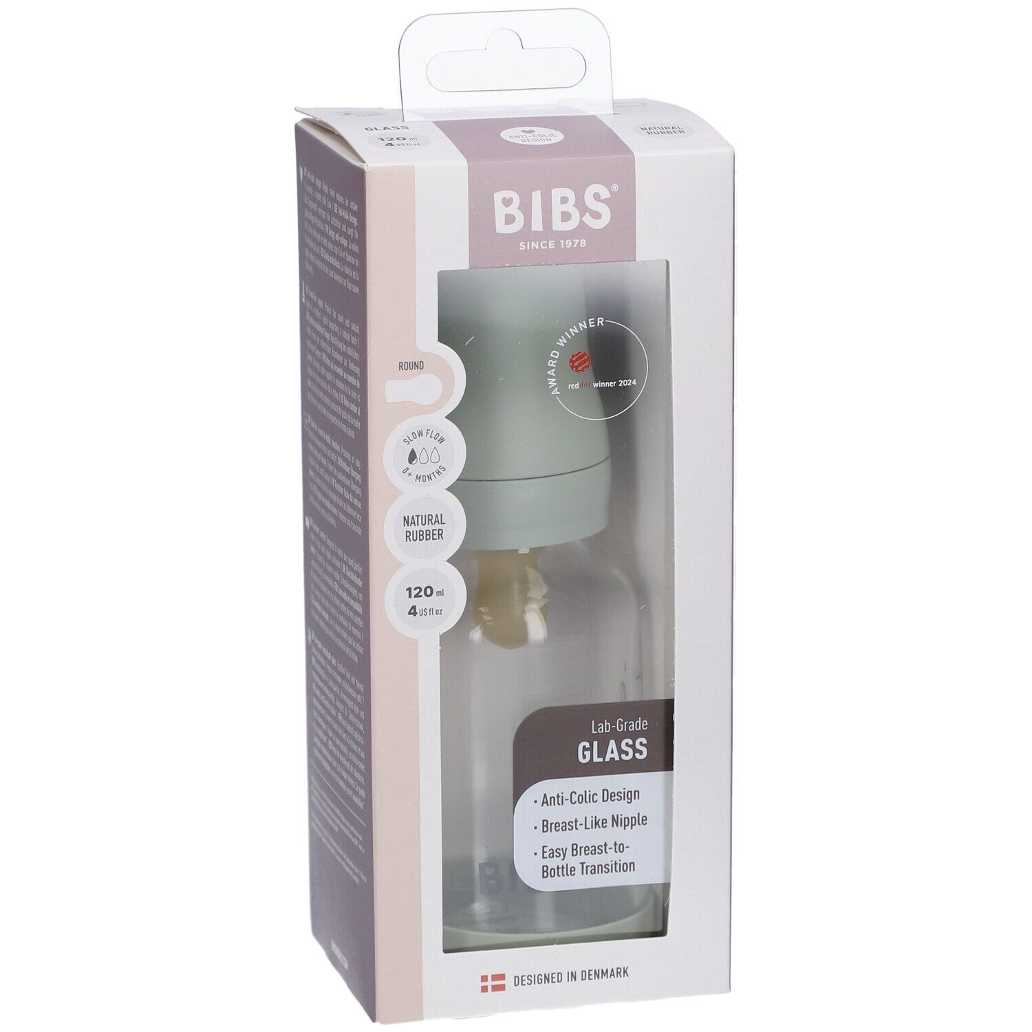 BIBS Babyflasche in Verpackung. Glasflasche mit grünem Deckel und Sauger. Sichtfenster zeigt Produkt.