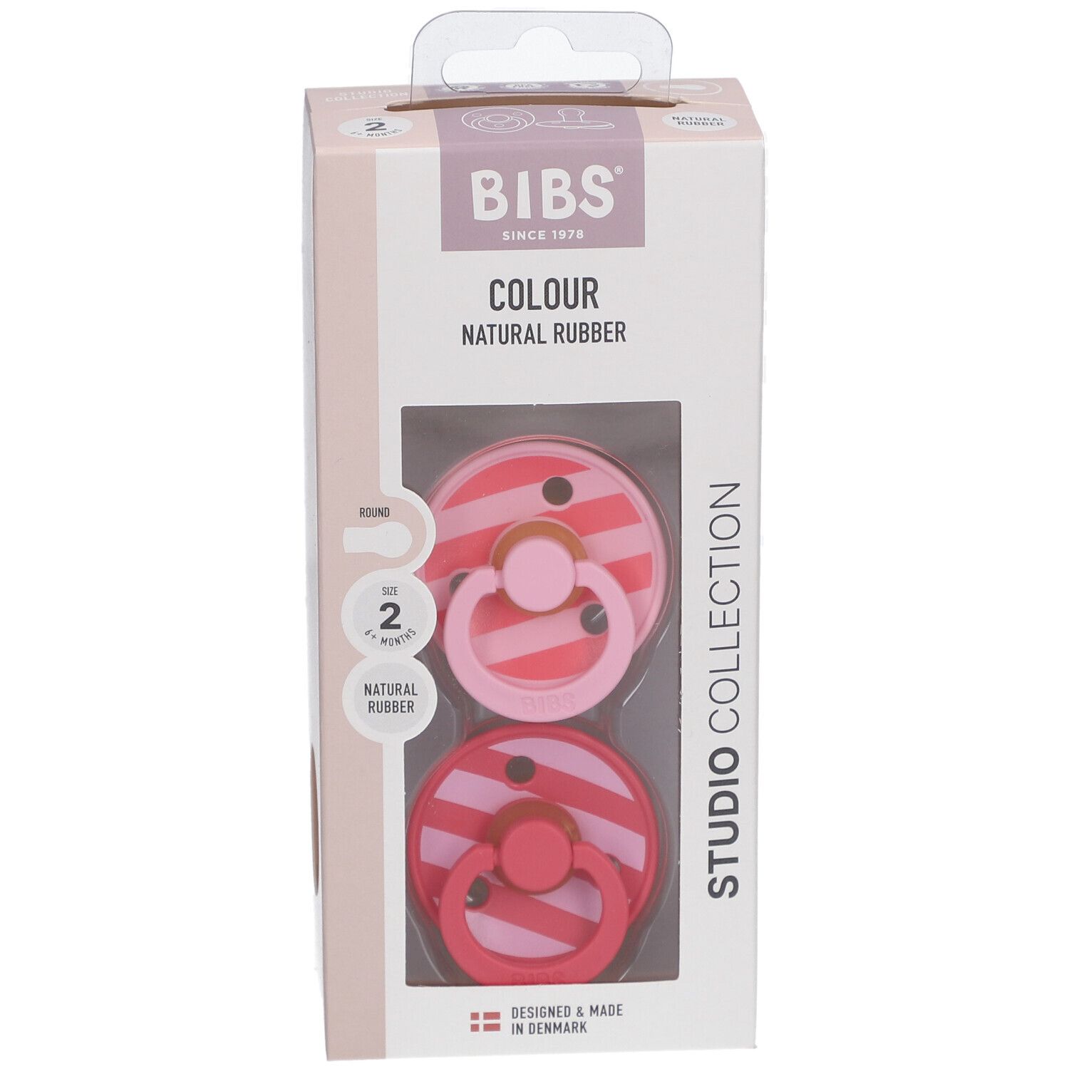 Verpackung mit zwei Schnullern. Rosa und rot gestreift. BIBS-Logo. Naturgummi. Ab 6 Monaten.