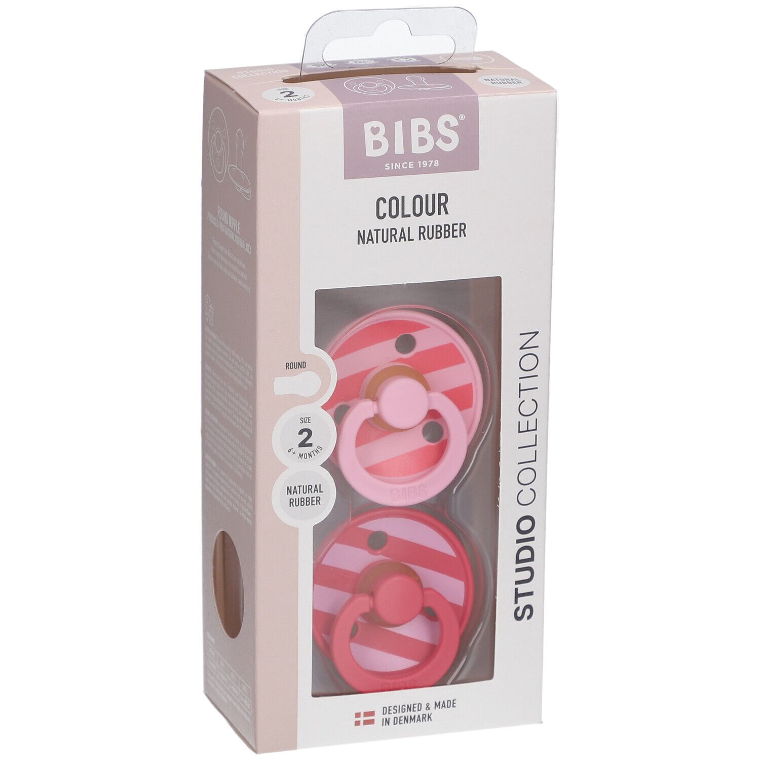 Verpackung mit zwei Schnullern. Rosa und rot gestreift. BIBS-Logo. Naturgummi. Ab 6 Monaten.