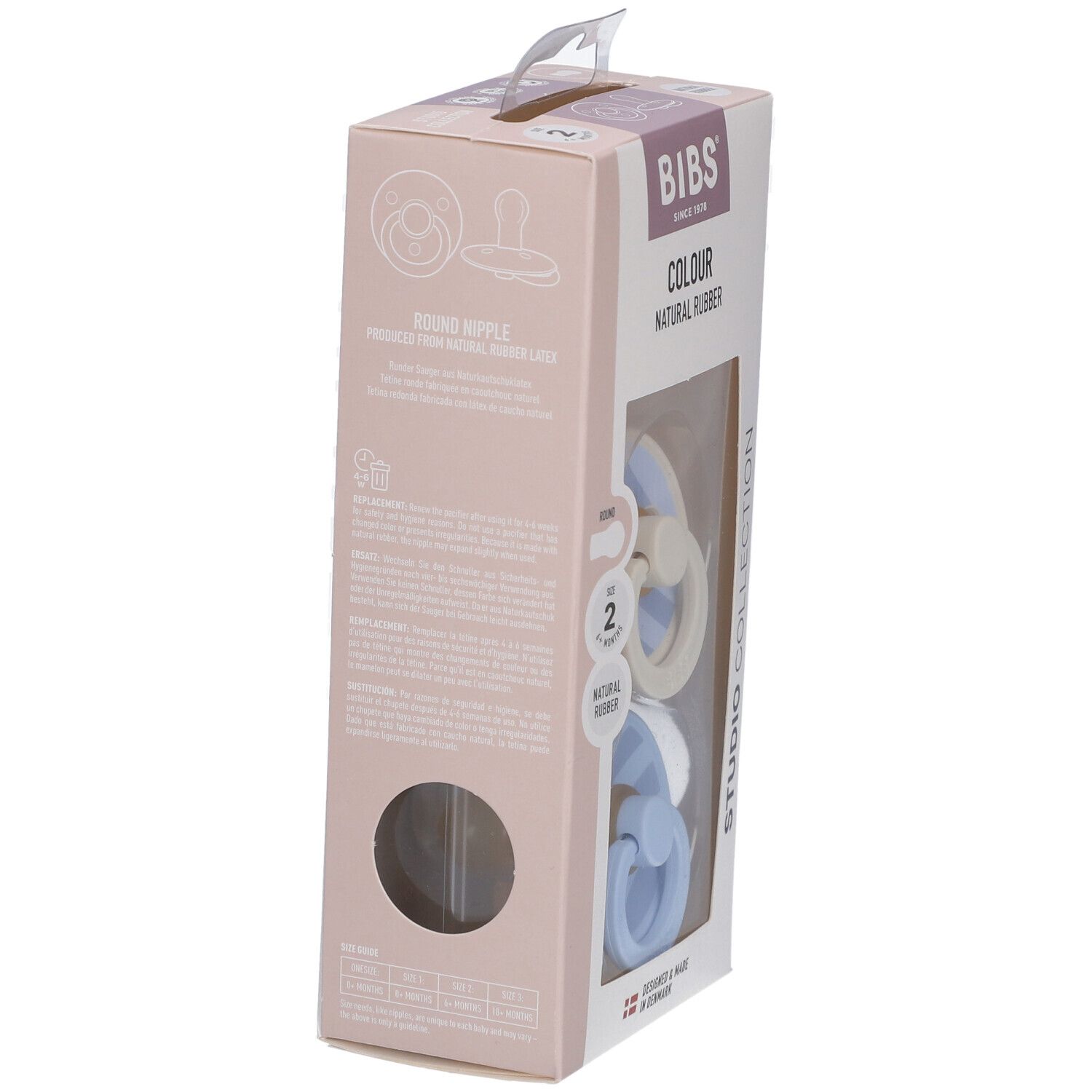 Verpackung mit zwei Schnullern. Blaue und cremefarbene Schnuller mit Streifenmuster. Marke BIBS, ab 6 Monaten.