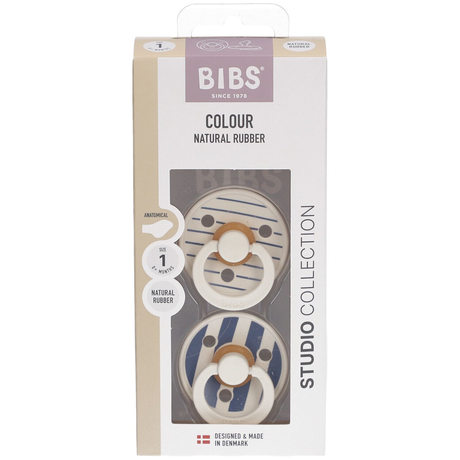 Verpackung mit zwei Schnullern. BIBS-Logo, 'COLOUR', 'NATURAL RUBBER'. Zwei Schnuller mit blau-weißem Streifenmuster.
