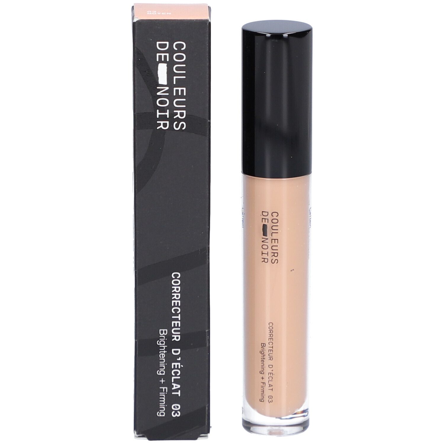 Concealer-Tube und Verpackung. Aufschrift: COULEURS DE NOIR, Correcteur d’éclat 03. Hellt auf und strafft. Beige Farbton.