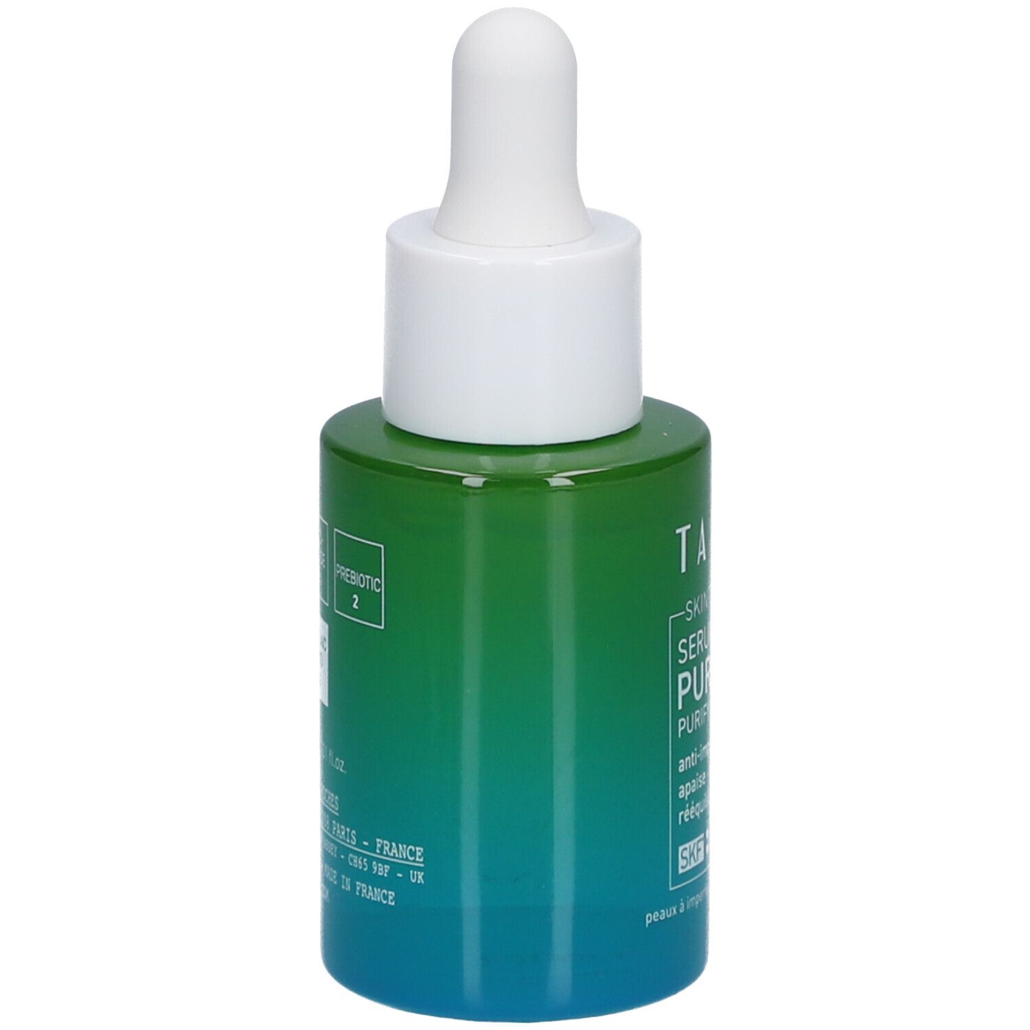 Rückseite einer grünen Flasche mit weißem Deckel und Pipette. Aufschrift: Talika Skin Intelligence Serum Purifiant.