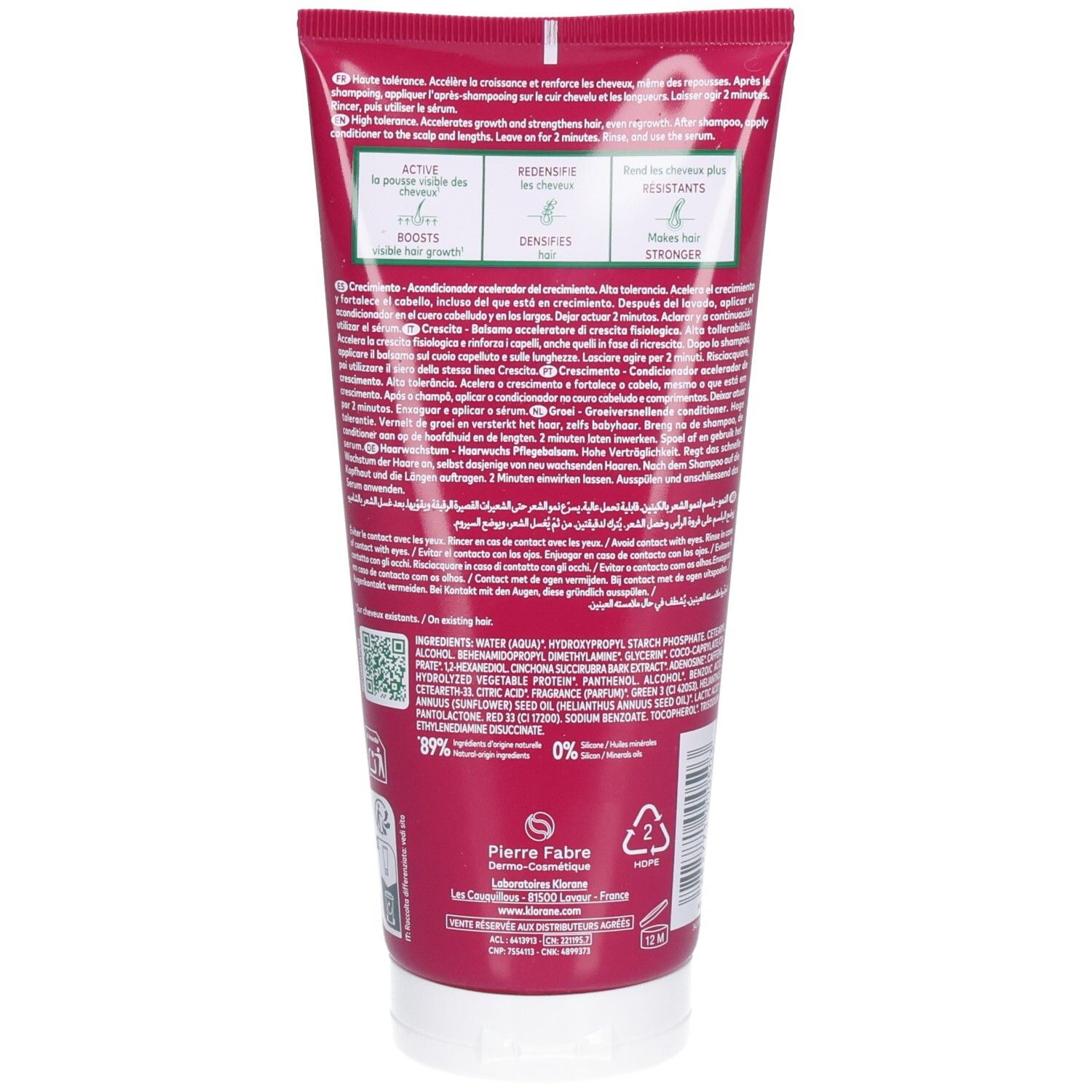 Rote Tube mit weißem Aufdruck, enthält Haarpflegeprodukt. Pierre Fabre Laboratoires.