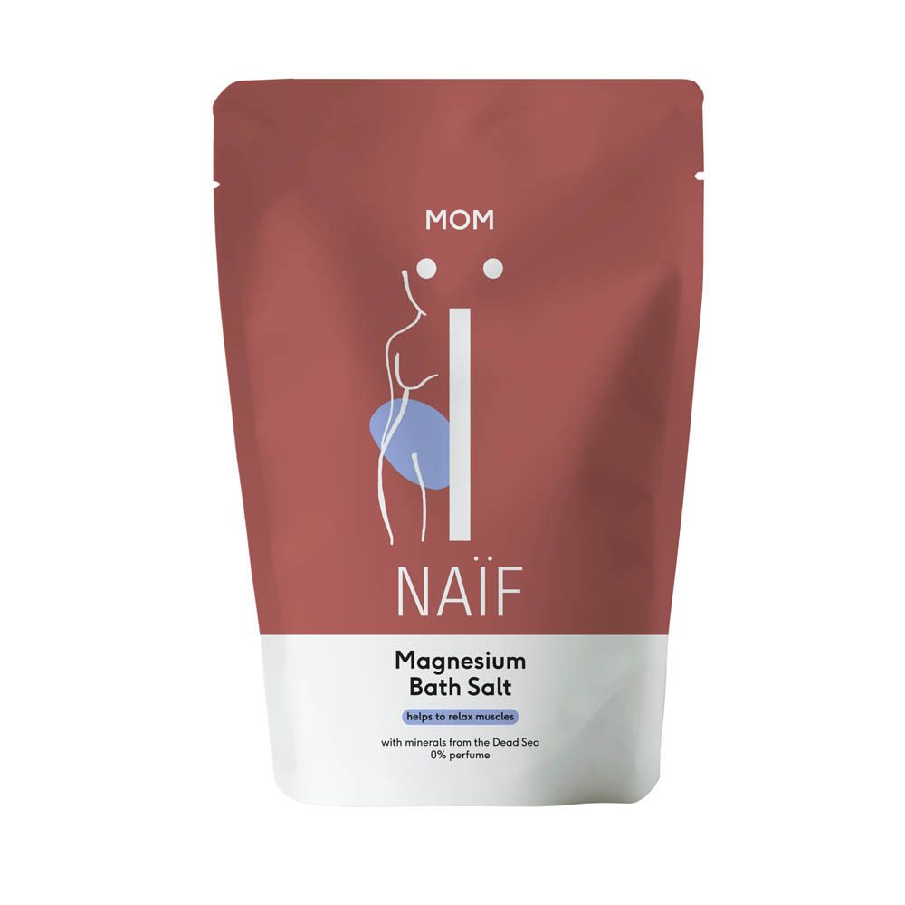 Sachet rose avec base blanche. Inscription: MOM, NAÏF, Magnesium Bath Salt. Illustration d'une femme enceinte. Aide à détendre les muscles.