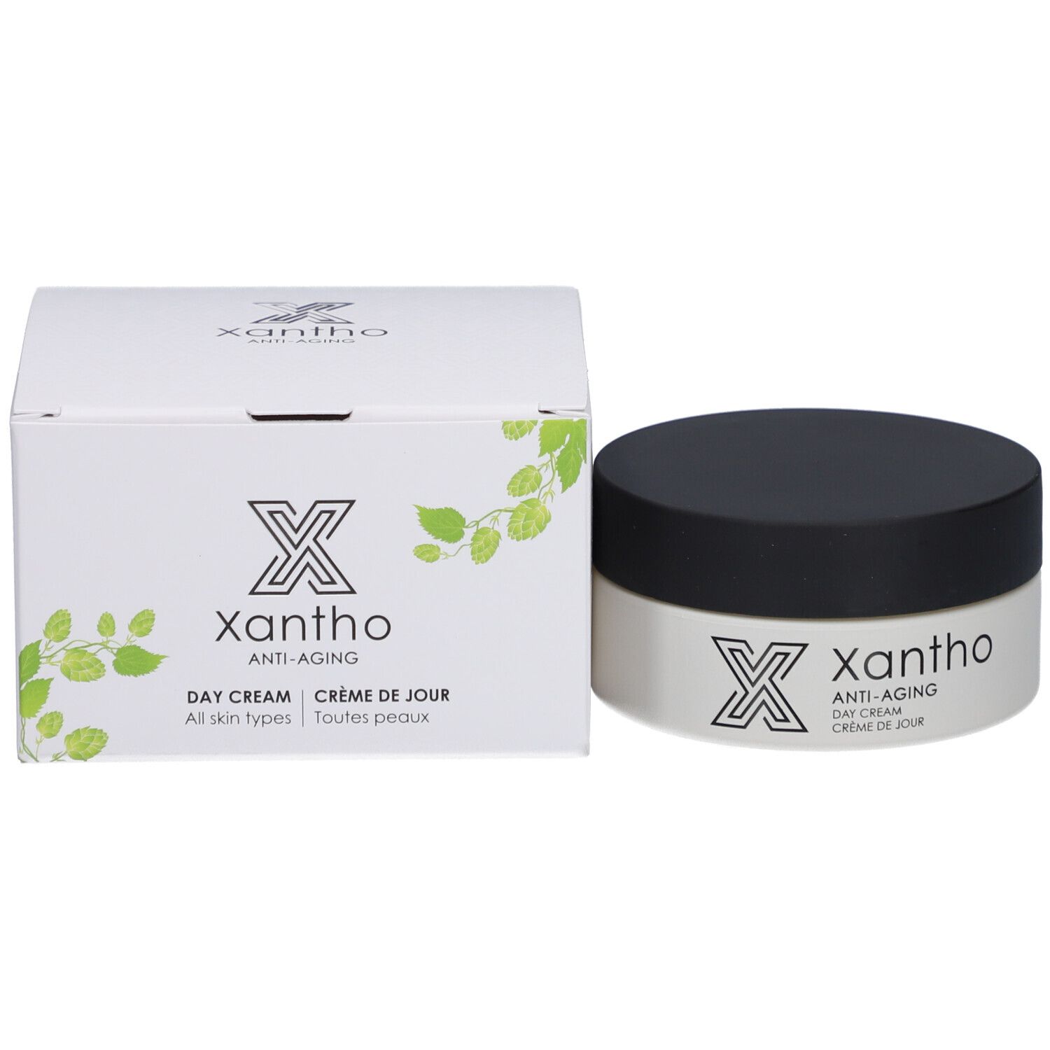 Xantho Anti-Aging Tagescreme und Verpackung, weißer Karton mit Pflanzenmotiv.