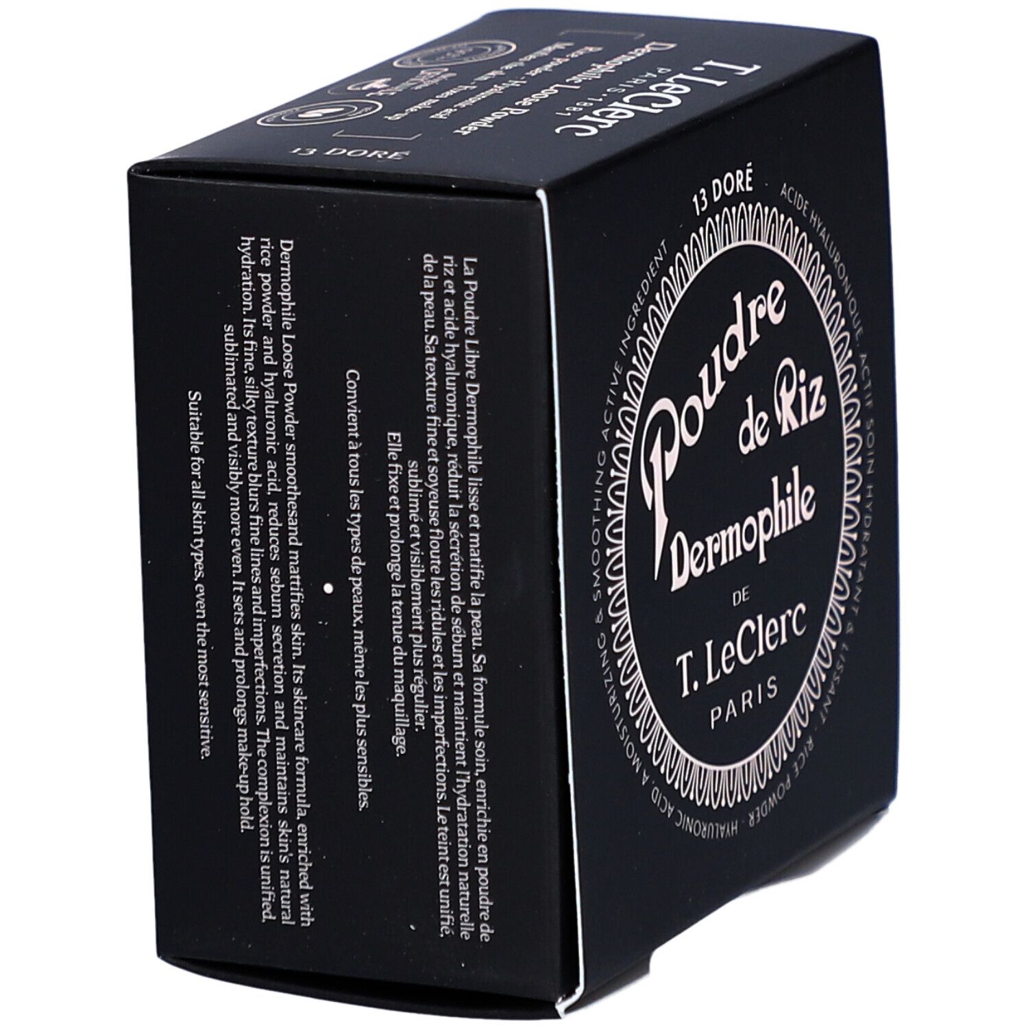 Schwarze Verpackung, schräg gestellt. Text in Weiß. Logo "Poudre de Riz Dermophile" mittig. "13 DORE" oben.