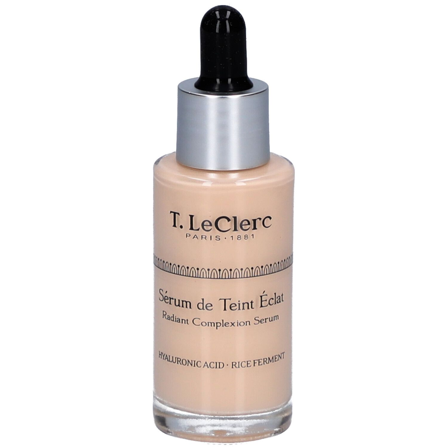 Beige Serumflasche mit silbernem Deckel und schwarzer Pipette. Beschriftung: T. LeClerc, Sérum de Teint Éclat.