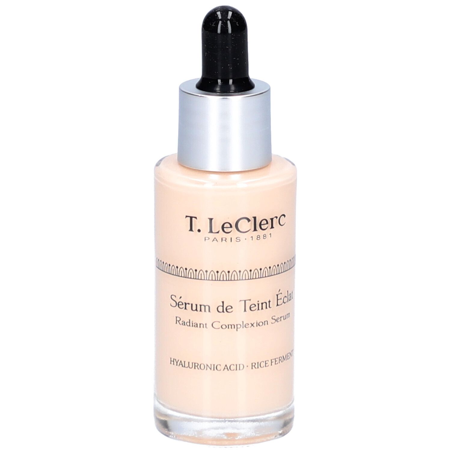 Beige Serumflasche mit silbernem Deckel und schwarzer Pipette. Beschriftung: T. LeClerc, Sérum de Teint Éclat.