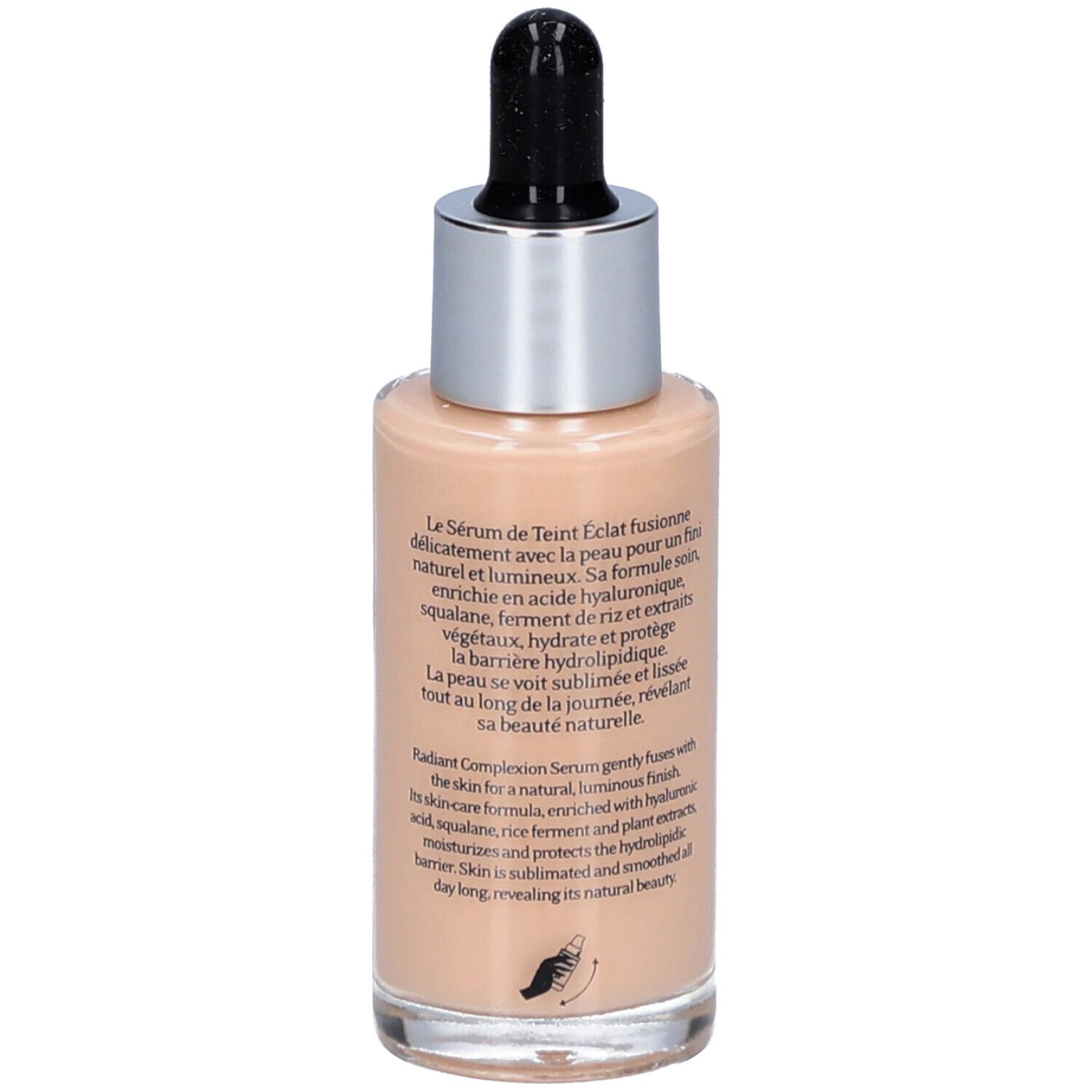 Rückseite des Serumflakons. Text mit Inhaltsstoffen und Beschreibung. Silberner Deckel, schwarze Pipette.