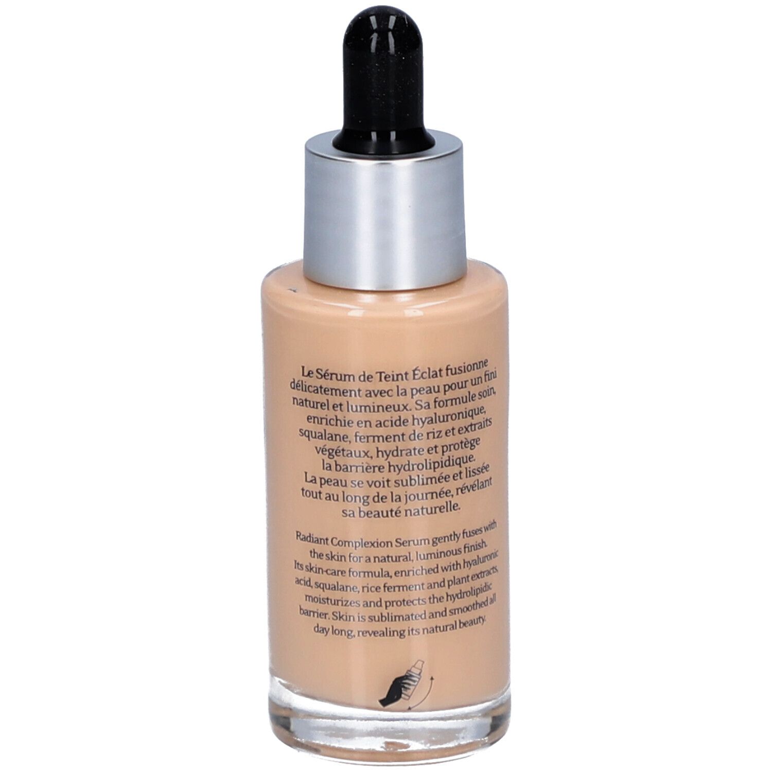 Rückseite des Serumflakons. Aufschrift: Sérum de Teint Éclat, Radiant Complexion Serum. Text in Französisch.