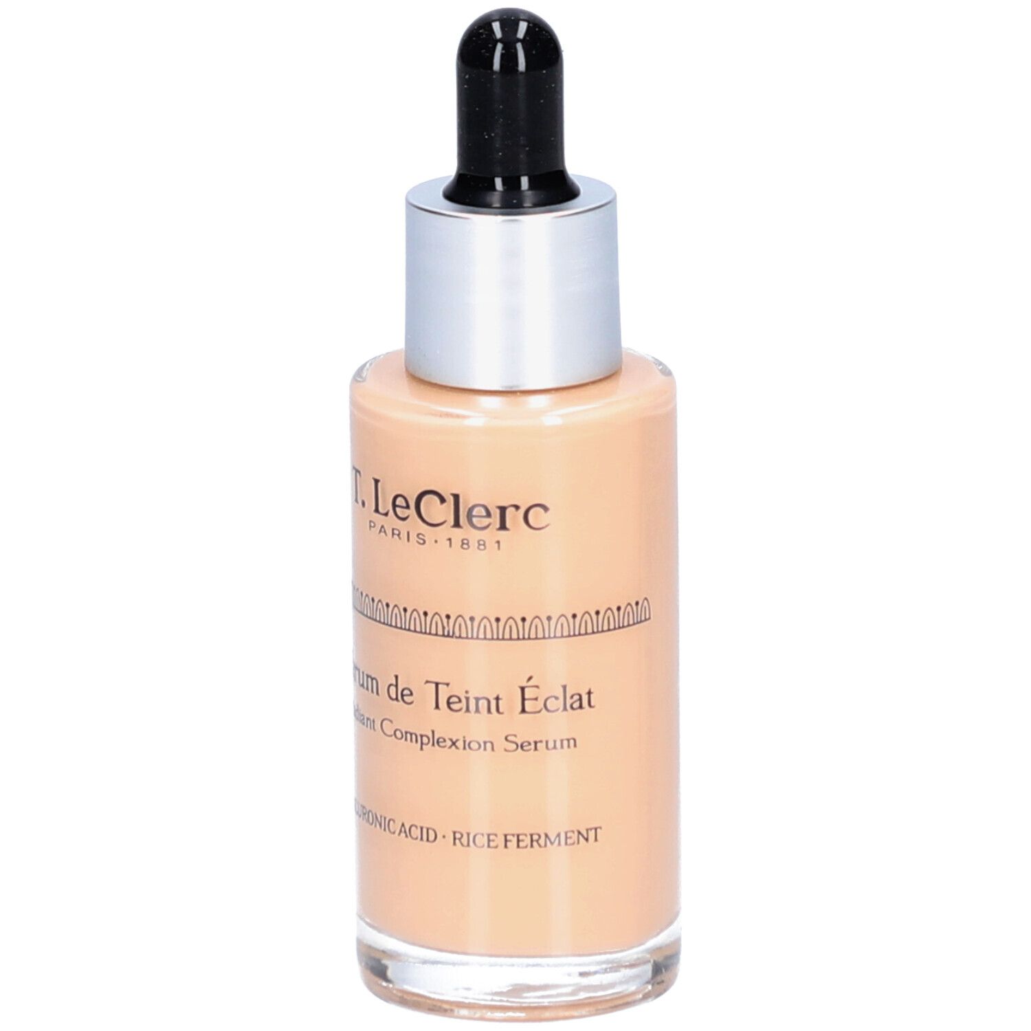 T.LeClerc Serum. Glasflasche mit Pipette. Beige Flüssigkeit. Beschriftung: Sérum de Teint Éclat, Hyaluronsäure, Reisferment.