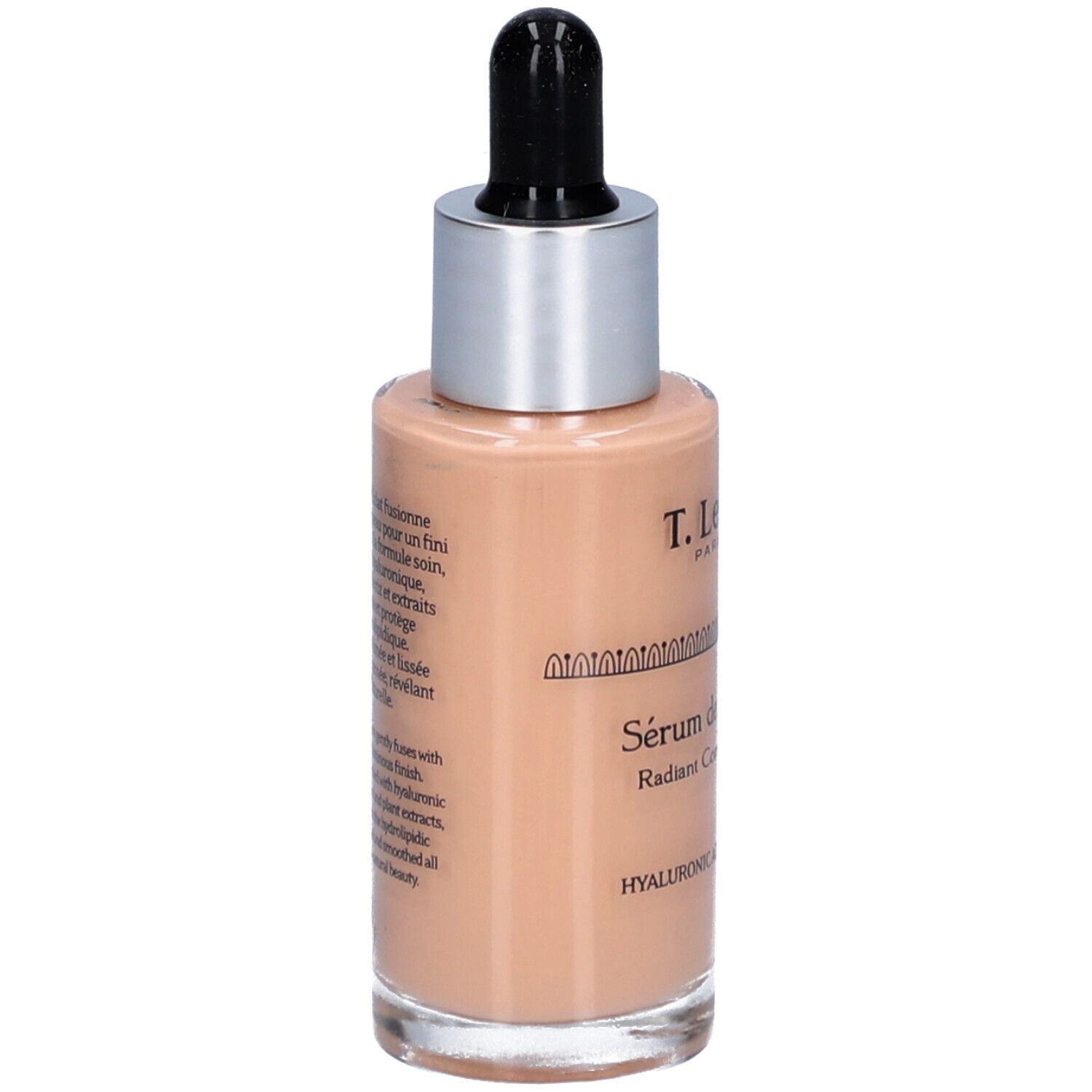 Rückansicht des Serumflakons. Glasflasche mit silbernem Deckel und schwarzer Pipette. Text auf der Flasche.