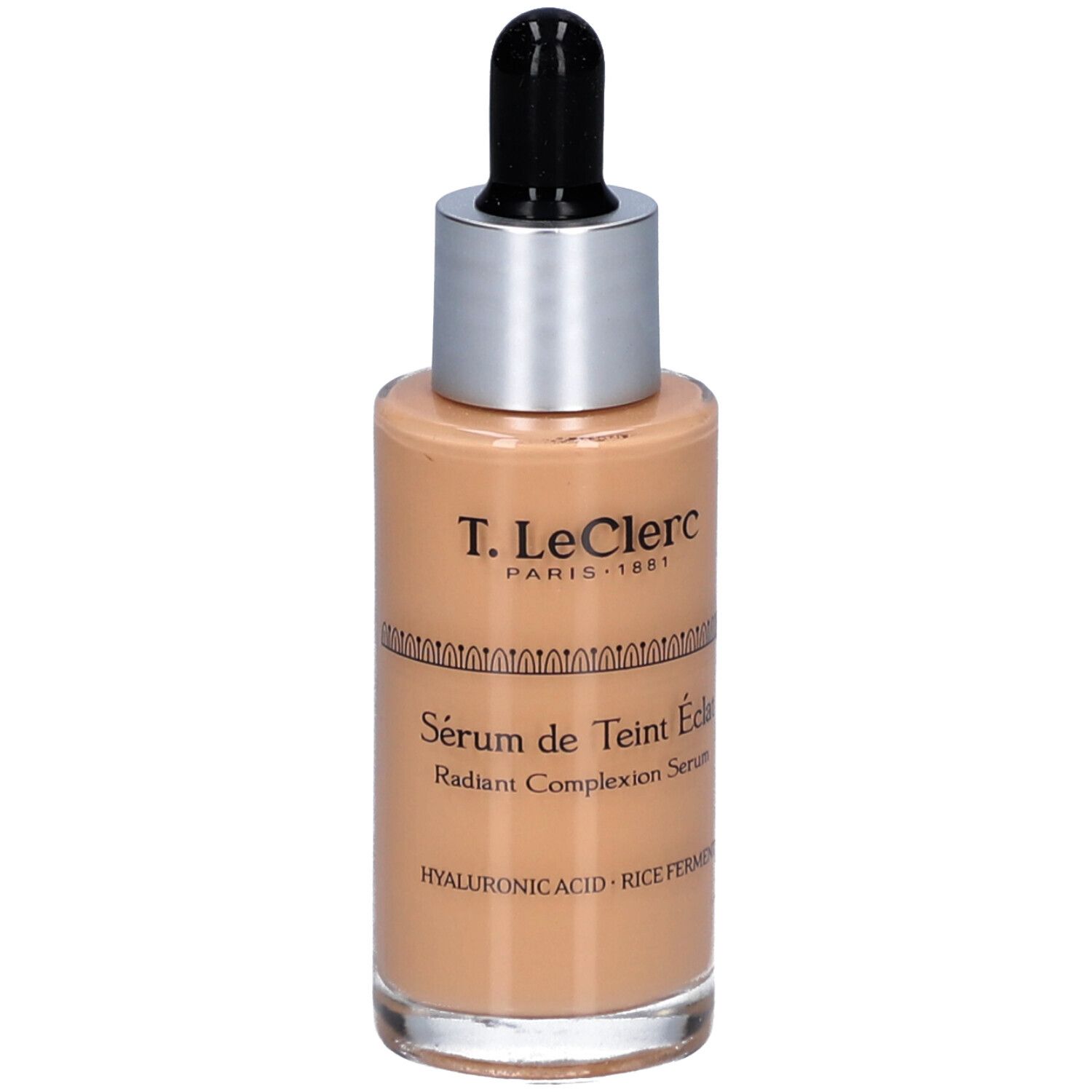 Serumflasche mit Pipette. Aufschrift: T. LeClerc Paris, Sérum de Teint Éclat, Radiant Complexion Serum. Enthält Hyaluronsäure und Reisferment.