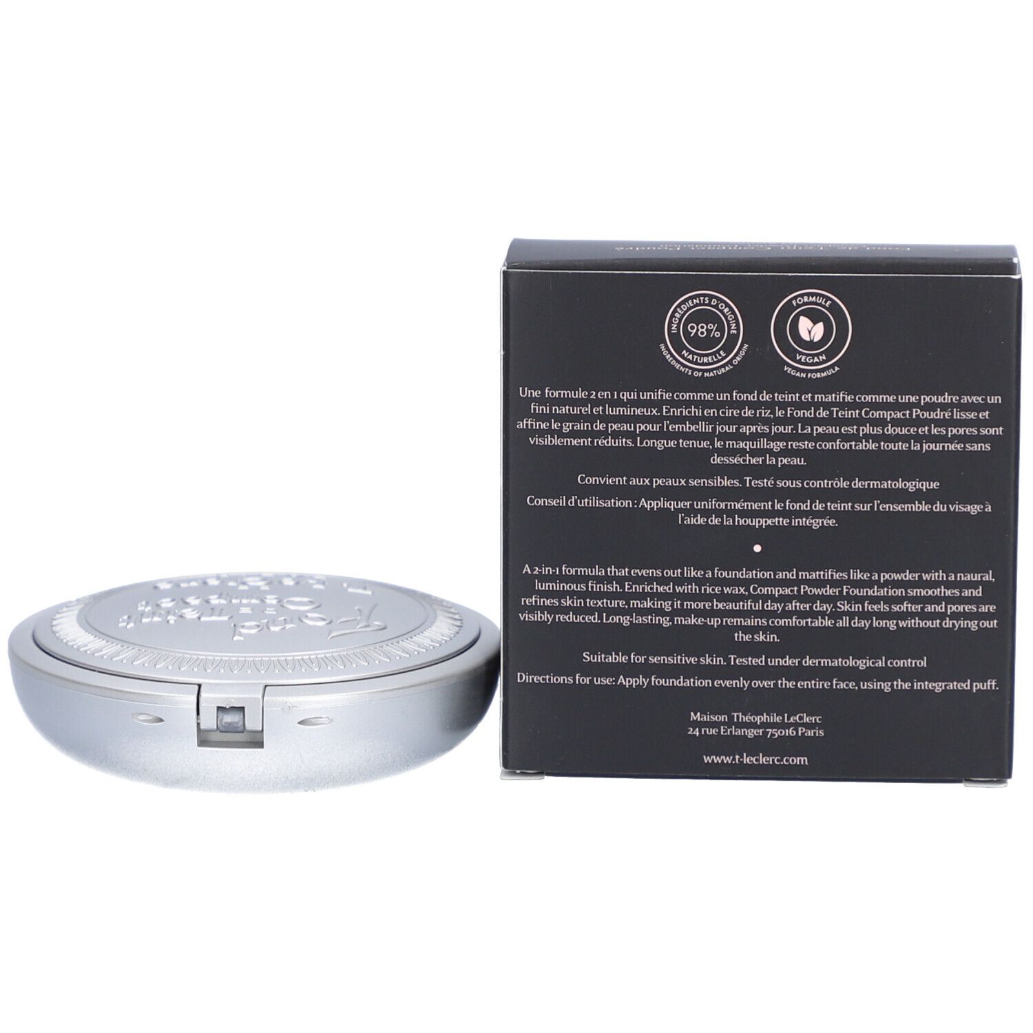 Kompaktpuder-Foundation mit Verpackung. Schwarze Schachtel mit Produktinformationen und silberfarbenes Puderdöschen.