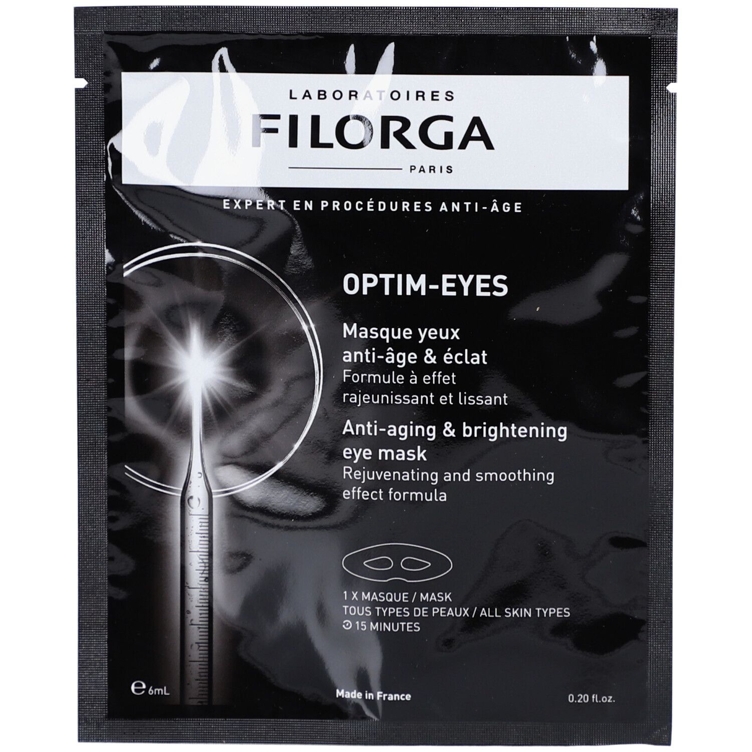 Filorga Optim-Eyes Augenmaske. Schwarze Verpackung mit Produktnamen und Logo. Enthält zwei Augenmasken. Text in Französisch und Englisch.